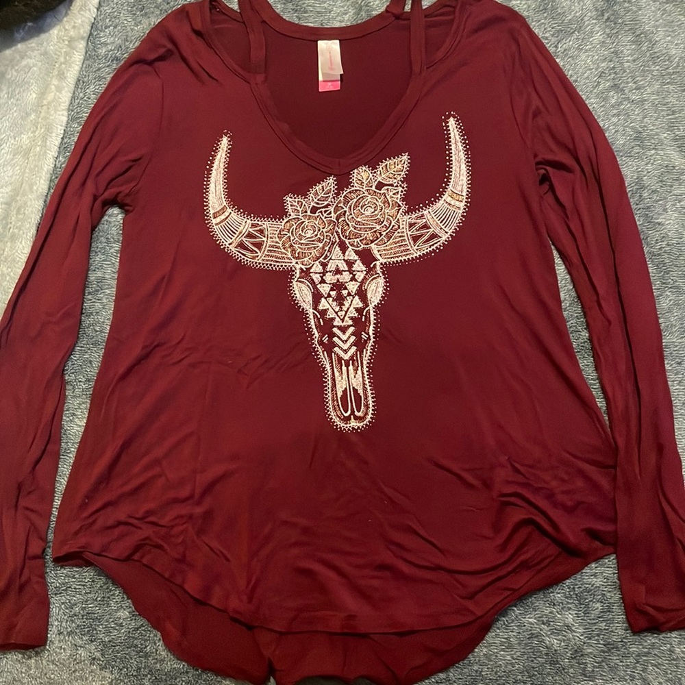 it’s red and with a animal skull on it